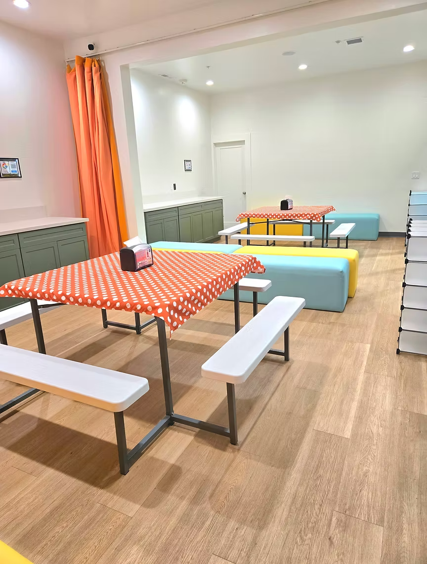 Funrise party room with colorful tables and seating for birthday celebrations