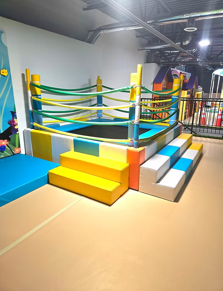 Bright trampoline and soft play area inside Funrise Indoor Playground