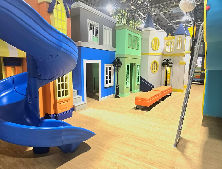 Funrise indoor playground slide and colorful play structure inside the Cedar Hills facility